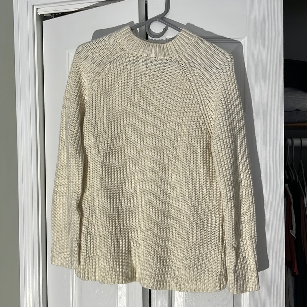 Cream colored long sweater from Forever21. Fits well over leggings.